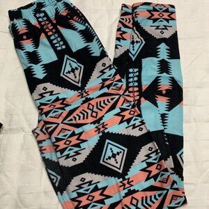 coral and turquoise printed leggings. one size